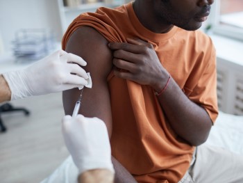 Man receiving vaccination